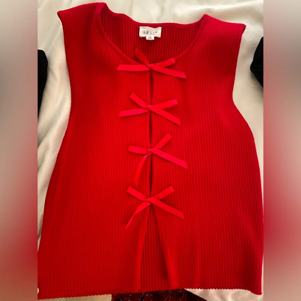 Red Sleeveless Top with Bow Accents